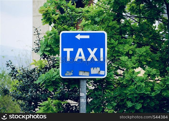 taxi stand traffic sign on the road in the street