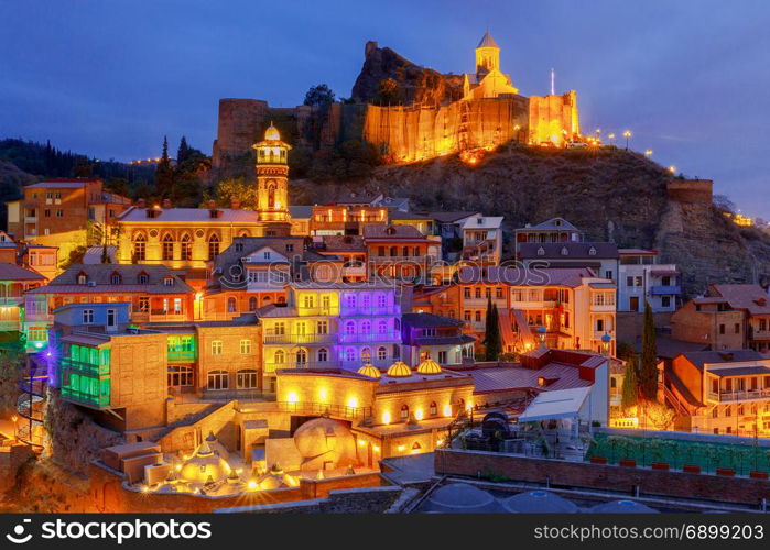 Tbilisi. Old city.. View of the old town and the citadel of Narikala at sunset. Tbilisi. Georgia.