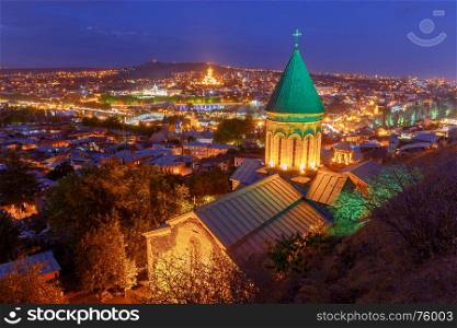 Tbilisi. View of the city at night.. Scenic aerial view of the city at sunset. Tbilisi. Georgia.
