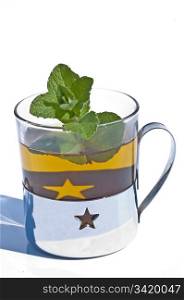 tea and peppermint leaves. tea with peppermint leaves