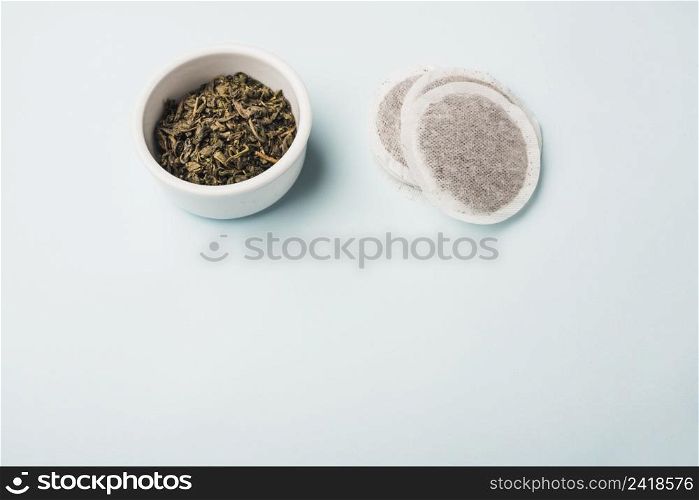 tea bags from petals blue background