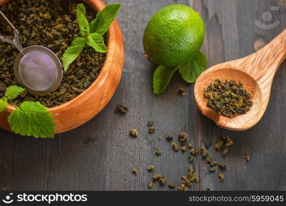 tea composition with cinnamon sticks, lemons