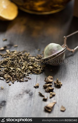 tea composition with cinnamon sticks, lemons