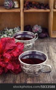 Tea from Sudanese rose. Medicinal tea a decoction of hibiscus tea in stylish cups.