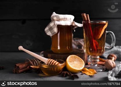 tea honey black background. High resolution photo. tea honey black background. High quality photo