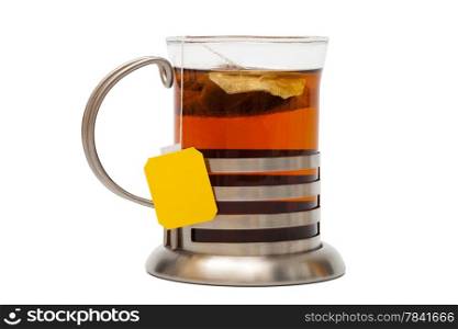 Tea in a glass with a cup holder on a white background