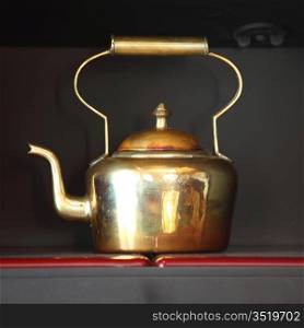 tea in brass pot close up
