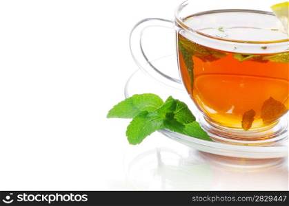 tea in cup with leaf mint isolated on white background