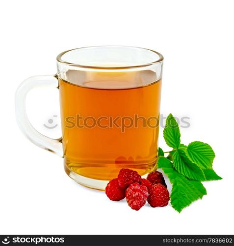 Tea in glass mug with raspberry and green leaf isolated on white background