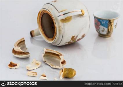 Tea lid debris that falls apart on a white background.