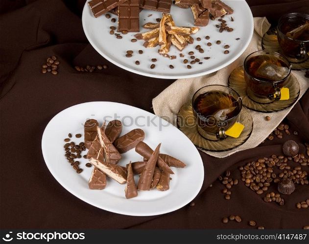 tea party set on dark brown background