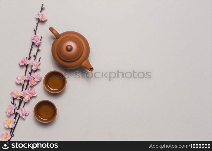 tea set cherry blossom branch. Resolution and high quality beautiful photo. tea set cherry blossom branch. High quality and resolution beautiful photo concept