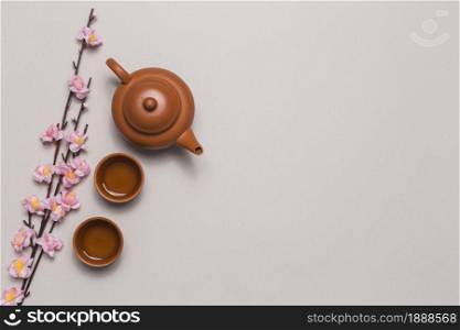 tea set cherry blossom branch. Resolution and high quality beautiful photo. tea set cherry blossom branch. High quality and resolution beautiful photo concept