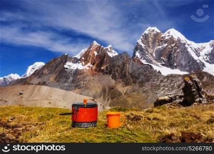 Tea set in high mountains. Hiking scene in Cordillera Huayhuach, Peru.