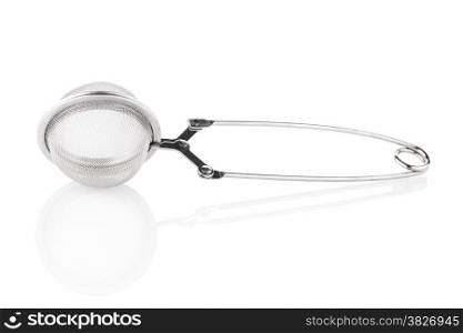 Tea strainer on a white reflective background.
