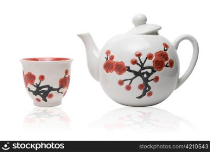 Tea-things in asian style with flowers. Isolated on white.