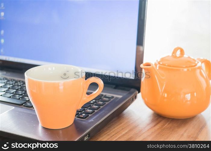 Tea time break on work table, stock photo