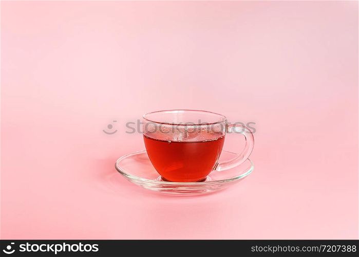 Tea time. Cup of tea on pink background with copy space. Minimal style.. Tea time. Cup of tea on pink background with copy space. Minimal style