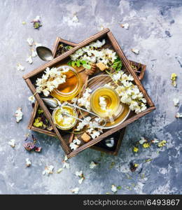 Tea with acacia flavor. Healing herbal tea with honey from acacia flowers.Herbal tea