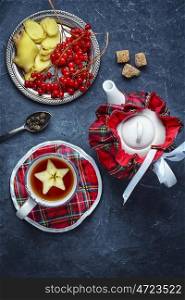 Tea with apple. Cup of tea with apple star on slate blue background