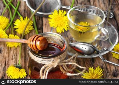 Tea with dandelion jam. Remedy tea with honey from spring dandelions