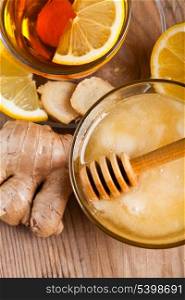 Tea with honey, lemon, and ginger. Healthcare concept for cold