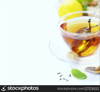 Tea with mint, ginger and lemon on white background