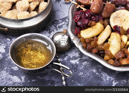 tea with oriental sweets. symbolic oriental tea with figs, dates and oriental sweets
