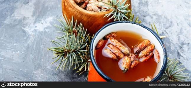Tea with pine buds for treating colds.Pine buds.Herbal medicine.Herbal tea. Tea with pine buds