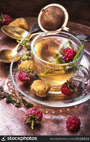 Tea with raspberries. Autumn warming and anti-cold tea with raspberries