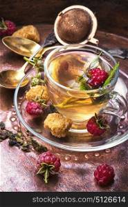 Tea with raspberries. Autumn warming and anti-cold tea with raspberries