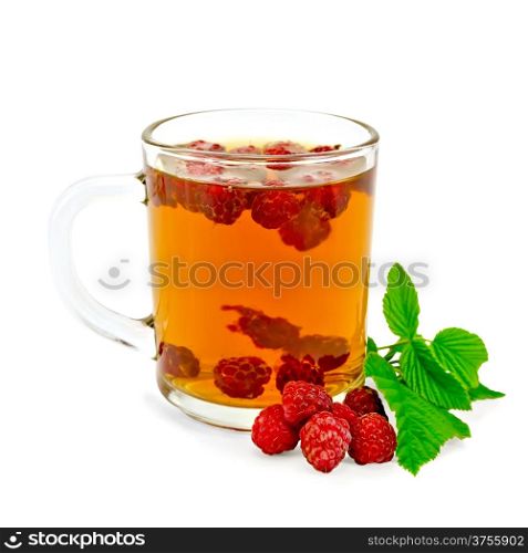Tea with raspberry in the glass mug, green leaf raspberry isolated on a white background
