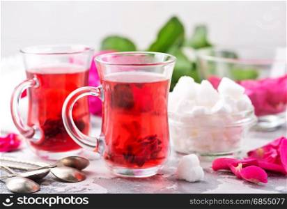 tea with rose on a table, stock photo