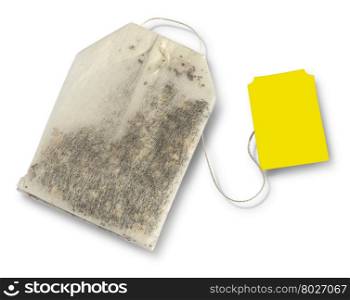 Teabag with yellow label. Top view. Isolated on a white. with clipping path