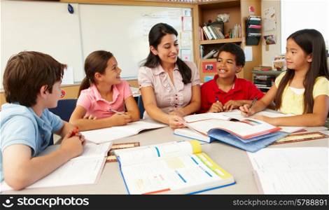 Teacher and schoolchildren in class