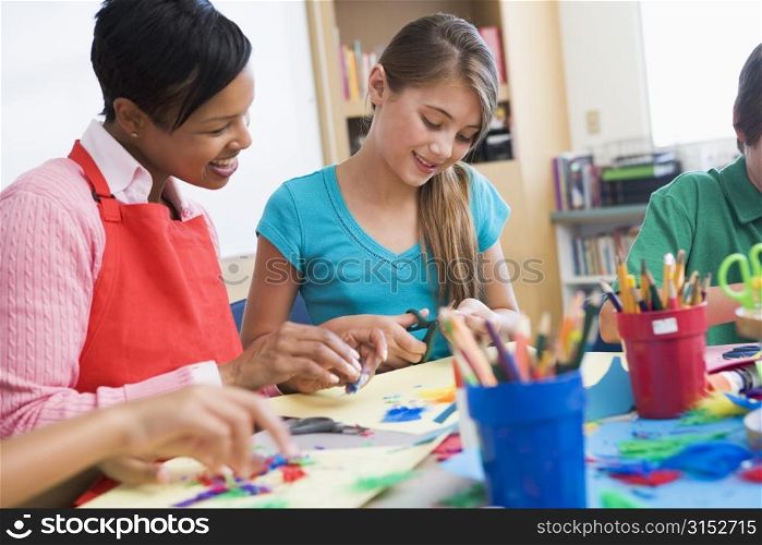 Teacher and student in art class (selective focus)
