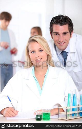 Teacher and student in the laboratory