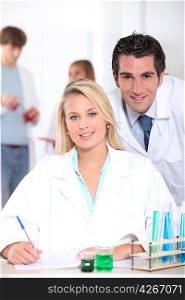 Teacher and student in the laboratory