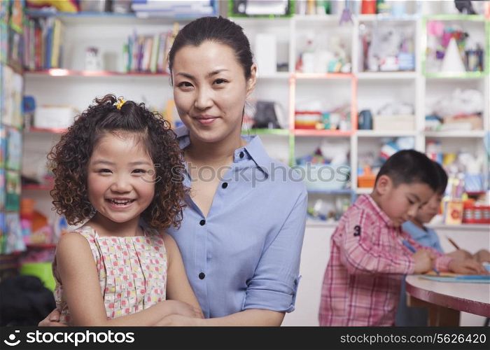 Teacher and Student Portrait Looking at Camera