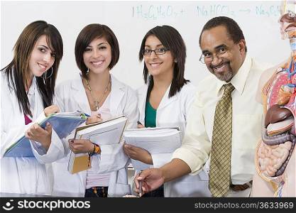 Teacher and Students in Science Lab