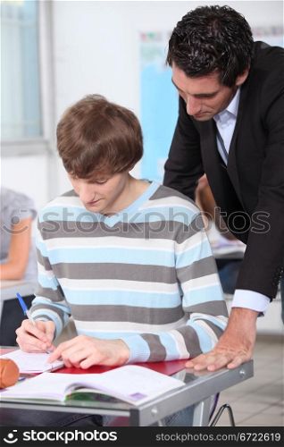 Teacher checking work