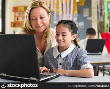 Teacher Helping Students