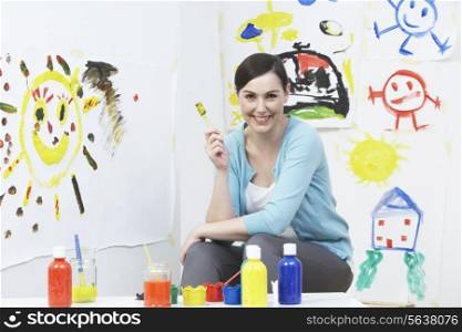 Teacher In Pre School Art Class
