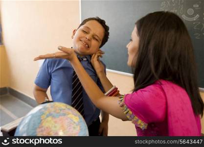 Teacher punishing a student