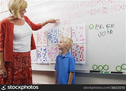 Teacher Talking with Little Boy