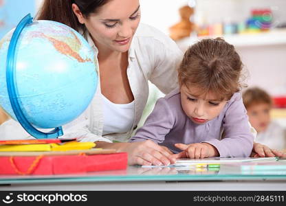 Teacher with pupils in class