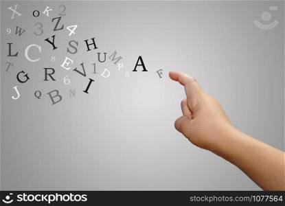 Teaching and Learning. Hand with letters flying