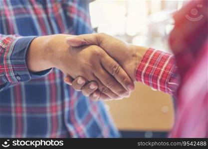 Team Busi≠ss Part≠rs shaking hands to≥ther to Greeting Start up small busi≠ss in meeting room. Shakehand teamwork part≠rs at modern office handshake to≥ther. Busi≠ss mer≥rs and acquisitions