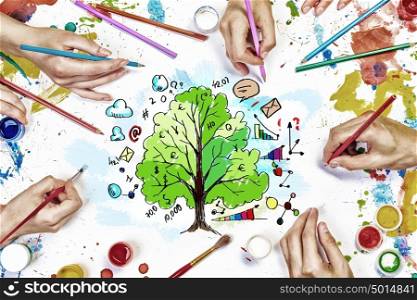 Team creative work. Top view of people hands drawing business growth and income concept