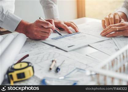 Team Engineer drawing graphic planning and meeting for architectural project on workplace